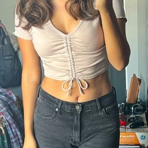 Beige crop top; Size medium and the fabric is very soft and light.